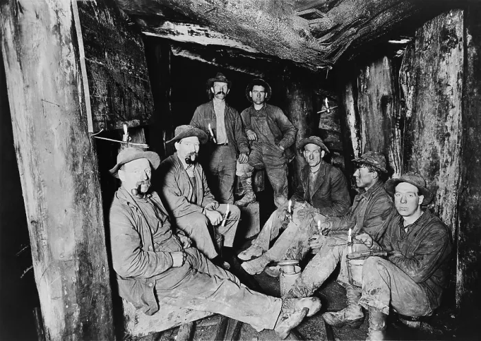 Framed Print : Seven miners pose for a photograph after lunch in the Last Chance Company mine in the Coeur d'Alene region of Idaho. The region was rich in silver, lead, gold and copper. Ca