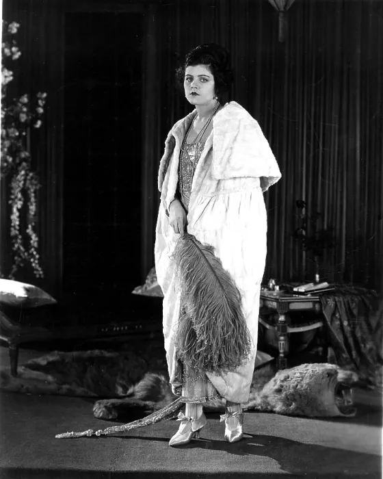 Framed Print : THE SHADOW OF ROSALIE BYRNES, Elaine Hammerstein, wearing a white ermine coat, accented with a blue ostrich plume, 1921