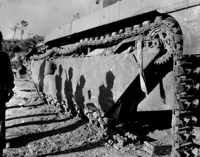 Framed Print : Shadows of 6th Division Marines on a battle-wrecked tank on Okinawa. The soldiers are advancing to mop up operations in the southern tip of the island Framed Print : Shadows of 6th Division Marines on a battle-wrecked tank on Okinawa. The soldiers are advancing to mop up operations in the southern tip of the island