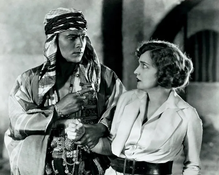Framed Print : THE SHEIK, from left, Rudolph Valentino, Agnes Ayres, 1921