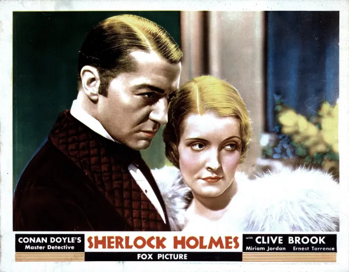 Framed Print : SHERLOCK HOLMES, from left, Clive Brook, Miriam Jordan, 1932, TM & Copyright 20th Century Fox. All rights reserved / Courtesy Everett Collection