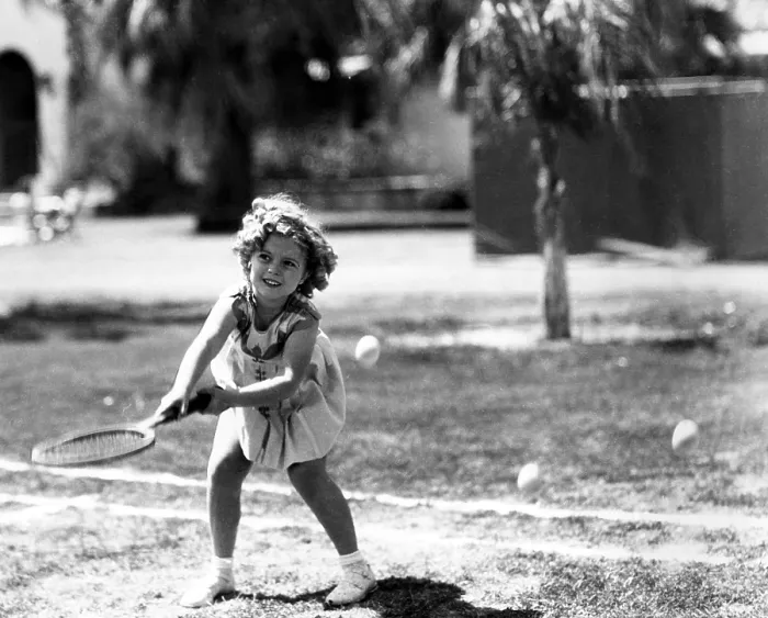 Framed Print : Shirley Temple, American actress, playing tennis, July 27, 1936. Courtesy: CSU Archives / Everett Collection