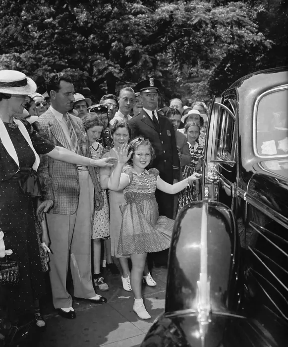 Framed Print : Shirley Temple leaving the White House after a visit to President Franklin Roosevelt. June 24, 1938. (BSLOC_2013_9_16) Framed Print : Shirley Temple leaving the White House after a visit to President Franklin Roosevelt. June 24, 1938. (BSLOC_2013_9_16)