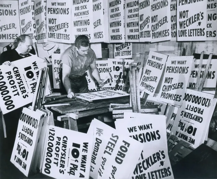 Framed Print : Sign contractor Stanley Sawicki and his helper Stanley Palka getting signs ready for a possible walkout of 89, 000 Chrysler workers, in Detroit, January 1950
