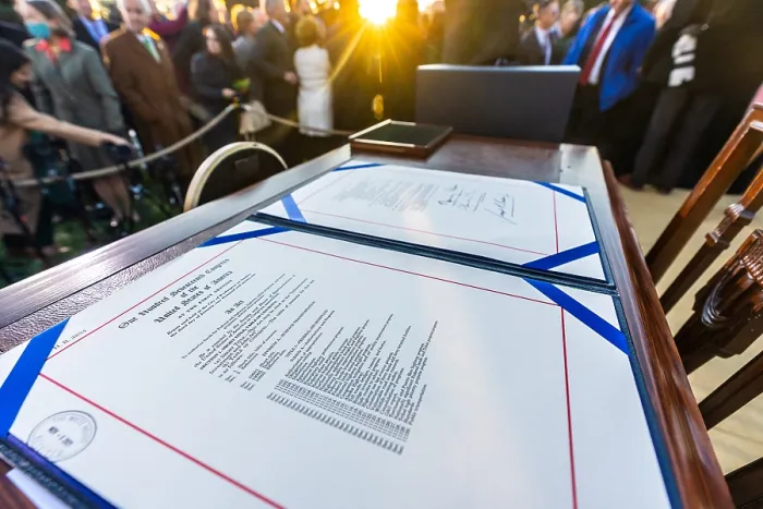 Framed Print : The signed copy of the Infrastructure Investment and Jobs Act is displayed after the signing ceremony on South Lawn of the White House. Nov. 15, 2021 (BSLOC_2021_14_38) Framed Print : The signed copy of the Infrastructure Investment and Jobs Act is displayed after the signing ceremony on South Lawn of the White House. Nov. 15, 2021 (BSLOC_2021_14_38)