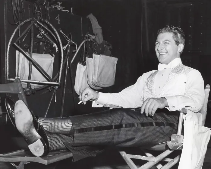Framed Print : SINCERELY YOURS, Liberace, relaxing on set, 1955, . ph: Pat Clark  /  TV Guide  /  courtesy Everett Collection