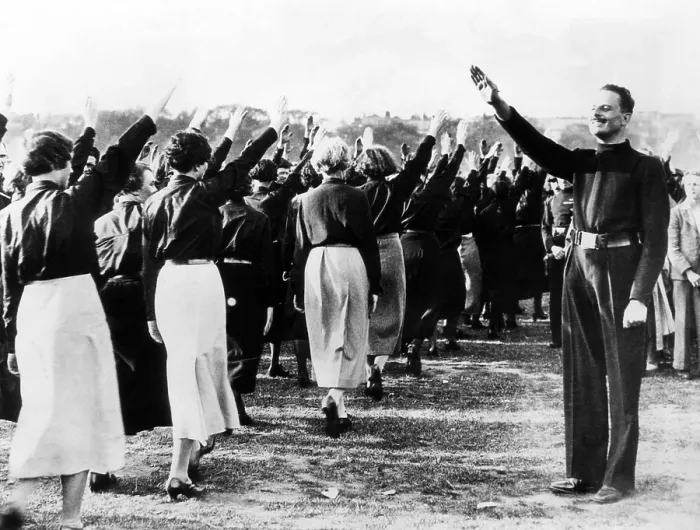Framed Print : Sir Oswald Mosley, leader of the British Union of Fascists, taking a salue fromt he womean members of the party a sthey arrived in Hyde Park, London, for a Blackshirt rally Framed Print : Sir Oswald Mosley, leader of the British Union of Fascists, taking a salue fromt he womean members of the party a sthey arrived in Hyde Park, London, for a Blackshirt rally