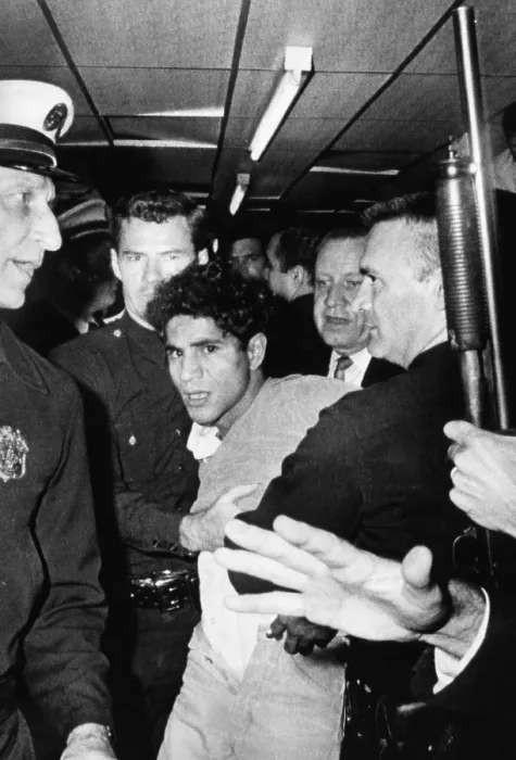 Framed Print : Sirhan Sirhan, the suspect in the shooting of Senator Robert F. Kennedy, being hustled out of the Ambassador Hotel, Los Angeles, California, June 5, 1968 Framed Print : Sirhan Sirhan, the suspect in the shooting of Senator Robert F. Kennedy, being hustled out of the Ambassador Hotel, Los Angeles, California, June 5, 1968