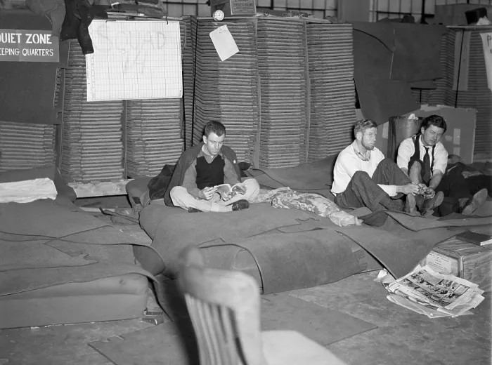Framed Print : Sit-down strikers in the General Motors Fisher body plant in Flint, Michigan. 1933. Sleeping quarters for striking autoworkers. (BSLOC_2013_6_100) Framed Print : Sit-down strikers in the General Motors Fisher body plant in Flint, Michigan. 1933. Sleeping quarters for striking autoworkers. (BSLOC_2013_6_100)