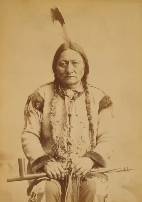 Framed Print : Sitting Bull (1831-1890), Lakota Sioux, holding a calumet, a ceremonial pipe and a token of peace, 1884