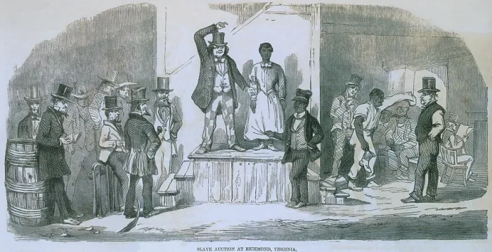 Framed Print : Slave auction in Richmond, Virginia in 1856. A women stands alone as bids are offered. On the right, a male slave is examined by a potential buyer. 1856
