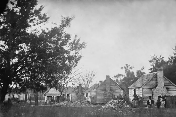 Framed Print : Slaves sitting near their cabins on a Port Royal, South Carolina plantation after the arrival of Union forces in late 1861 Framed Print : Slaves sitting near their cabins on a Port Royal, South Carolina plantation after the arrival of Union forces in late 1861