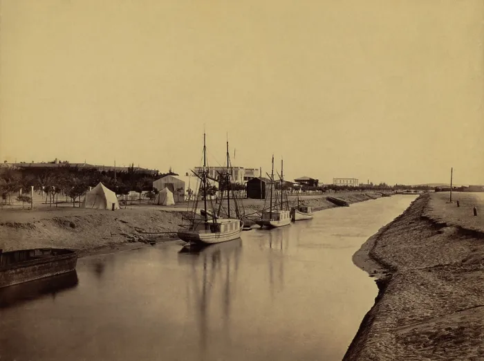 Framed Print : Small boats moored at water's edge to the Suez Canal at Ismailia. The Ismailia segment of the modern canal was completed in November 1862. 1860 photo by Francis Frith