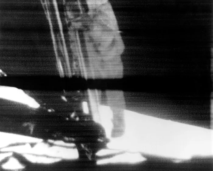 Framed Print : One Small Step for Man, One Giant Step for Mankind. Neil Armstrong exits the Lunar Module Eagle to the surface of the Moon