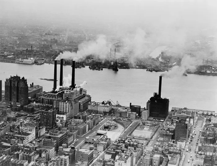 Framed Print : Smoke issues from stacks of Con Edison's coal powered electricity generating plant on the East River. New York City, February 15, 1951