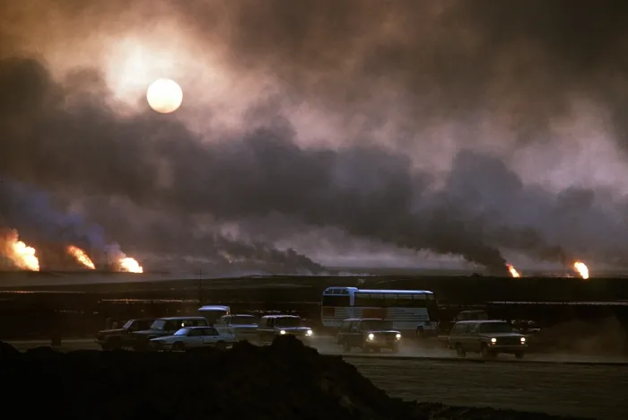 Framed Print : The smoke from oil well fires forces Kuwait drivers to use their headlights during daylight. Retreating Iraqi troops set fire to Kuwait's oil fields. April 22 1991 Framed Print : The smoke from oil well fires forces Kuwait drivers to use their headlights during daylight. Retreating Iraqi troops set fire to Kuwait's oil fields. April 22 1991