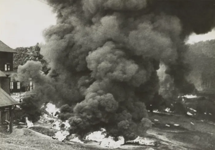 Framed Print : Smoke rises from a rubber factory destroyed by the retreating British forces in Malaya Framed Print : Smoke rises from a rubber factory destroyed by the retreating British forces in Malaya
