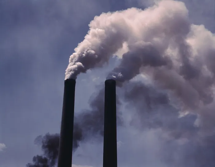 Framed Print : Smoke stacks were a symbol of industrial growth and prosperity when this wartime color photo was made in 1942, by U.S. government photographer, Alfred Palmer