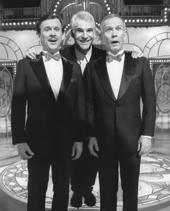 Framed Print : SMOTHERS BROTHERS COMEDY HOUR 20TH REUNION, from left: Dick Smothers, Steve Martin, Tommy Smothers, (aired February 3, 1988), 1988