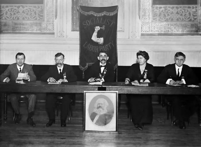Framed Print : Socialist Labor Party posed with a portrait of Karl Marx. New York City, c. 1910. L-R: Paul Augustine, John Juergens, H.J. Poelling, Edith L