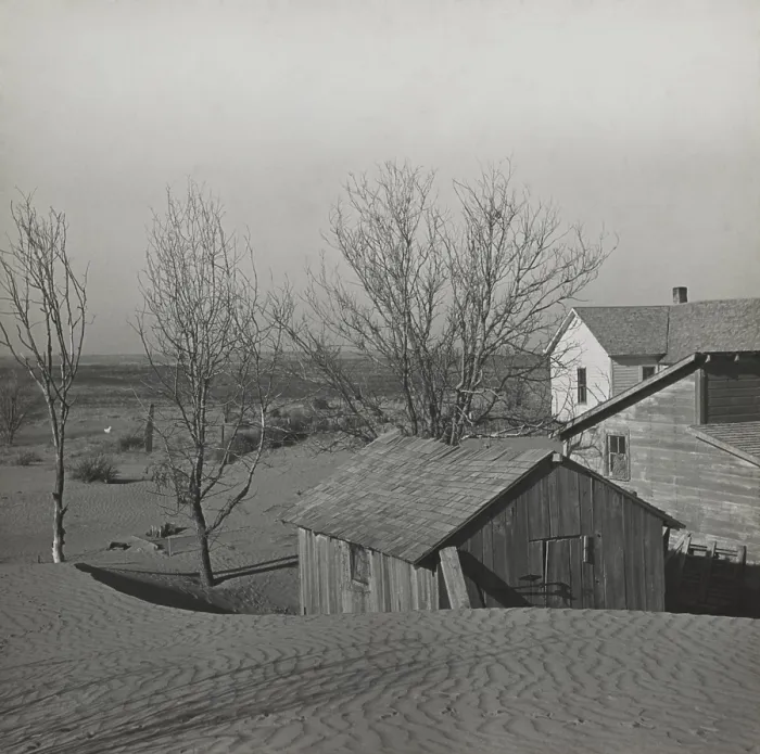 Framed Print : Soil blown by dust bowl winds piled up in large drifts on a Kansas farm. March 1936. Photo by Arthur Rothstein. - (BSLOC_2015_1_210)