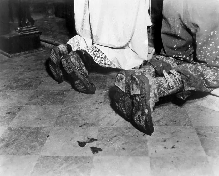 Framed Print : With soiled army boots, a Chaplain and soldier kneel at Catholic Mass is held for two dead soldiers. Oct. 11, 1944. San Benedetto, Italy. World war 2. (BSLOC_2014_10_51)