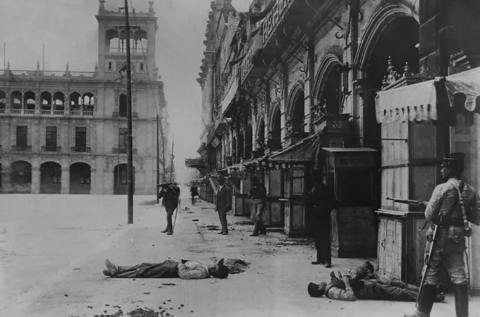 Framed Print : Soldier on alert among dead bodies in Mexico City, Feb. 1913. Probably during the Ten Tragic Days of the overthrow and murder of President Madero (BSLOC_2016_13_37.jpg )