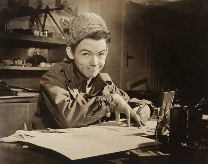 Framed Print : Soldier-Cartoonist Bill Mauldin seated at desk in office in Il Messagero building, Rome, Italy. Ca. 1945. (BSLOC_2014_8_212)
