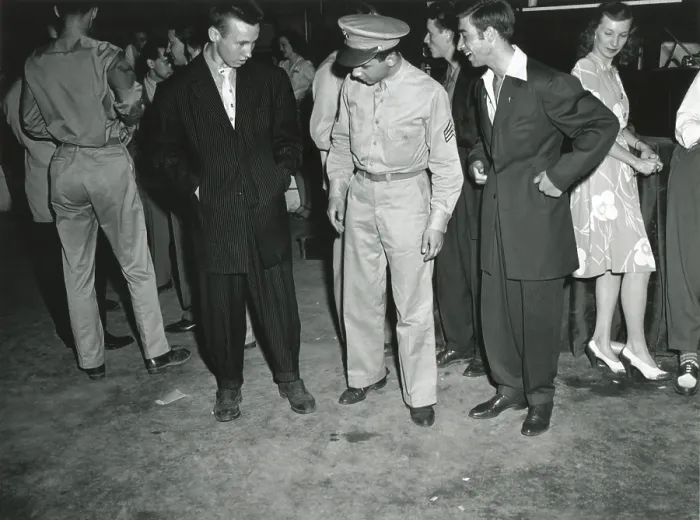 Framed Print : Soldier inspects Zoot Suiters at an intermission of Woody Herman's Orchestra engagement. At the Uline Arena, Washington, D.C. June 1942 Framed Print : Soldier inspects Zoot Suiters at an intermission of Woody Herman's Orchestra engagement. At the Uline Arena, Washington, D.C. June 1942