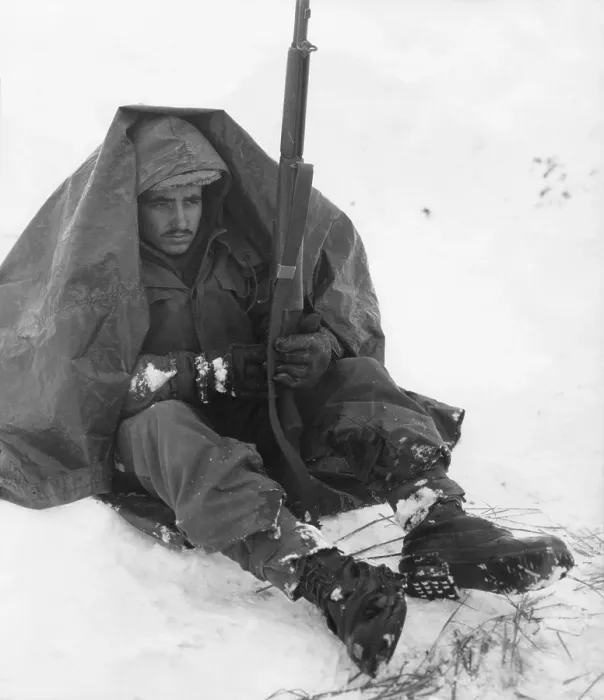 Framed Print : Soldier of the U.S. 19th Infantry Regiment uses his poncho to get protection from the biting wind and cold. Yoju area Jan. 10, 1951, after the withdrawal of U.N Framed Print : Soldier of the U.S. 19th Infantry Regiment uses his poncho to get protection from the biting wind and cold. Yoju area Jan. 10, 1951, after the withdrawal of U.N