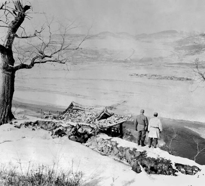 Framed Print : Two UN soldiers gaze across the Yalu River to the mountains of Manchuria on Nov. 21, 1950