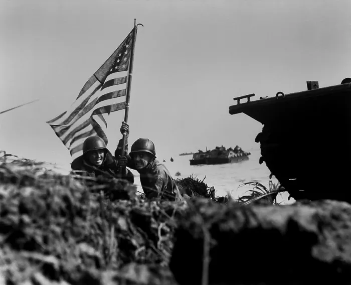 Framed Print : Soldiers plant the American flag on Guam eight minutes after U.S. assault troops landed Framed Print : Soldiers plant the American flag on Guam eight minutes after U.S. assault troops landed