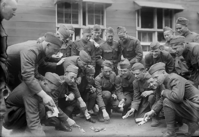 Framed Print : Soldiers playing a dice game, original title: Craps at camp, photograph circa 1900s-1930s Framed Print : Soldiers playing a dice game, original title: Craps at camp, photograph circa 1900s-1930s