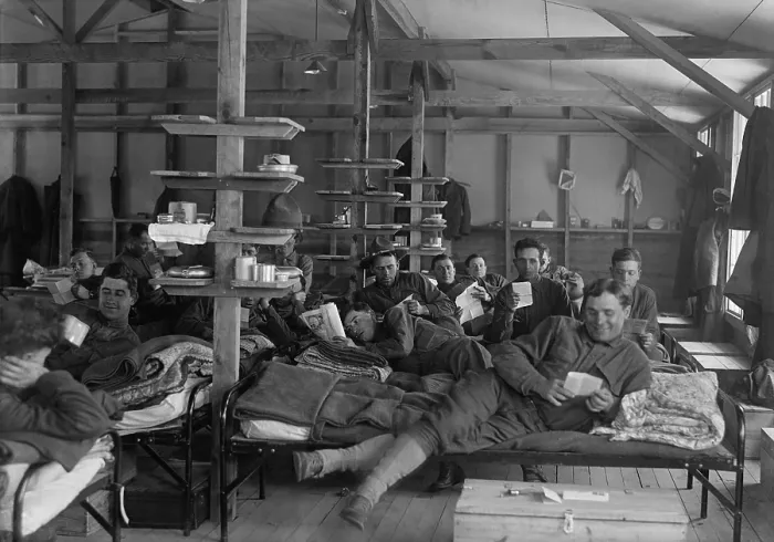 Framed Print : Soldiers relaxing on their beds in the barracks at Camp Mead, Maryland, Dec. 1917. (BSLOC_2016_13_106.jpg )