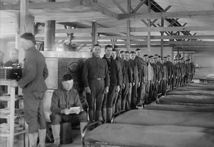 Framed Print : Soldiers stand in a row by their beds in the barracks at Camp Mead, Maryland, Dec. 1917. (BSLOC_2016_13_105.jpg )