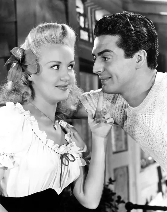 Framed Print : SONG OF THE ISLANDS, from left, Betty Grable, Victor Mature, 1942, 20th Century Fox, TM & Copyright / Courtesy: Everett Collection Framed Print : SONG OF THE ISLANDS, from left, Betty Grable, Victor Mature, 1942, 20th Century Fox, TM & Copyright / Courtesy: Everett Collection