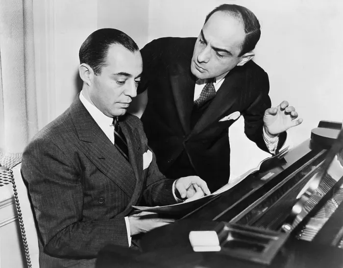 Framed Print : Songwriting team Richard Rodgers at piano working with lyricist Lorenz Hart. 1936. (BSLOC_2013_9_14)