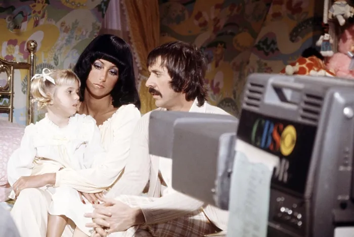Framed Print : THE SONNY AND CHER COMEDY HOUR, from left: Chastity Bono, Cher, Sonny Bono, (1974), 1971-1974