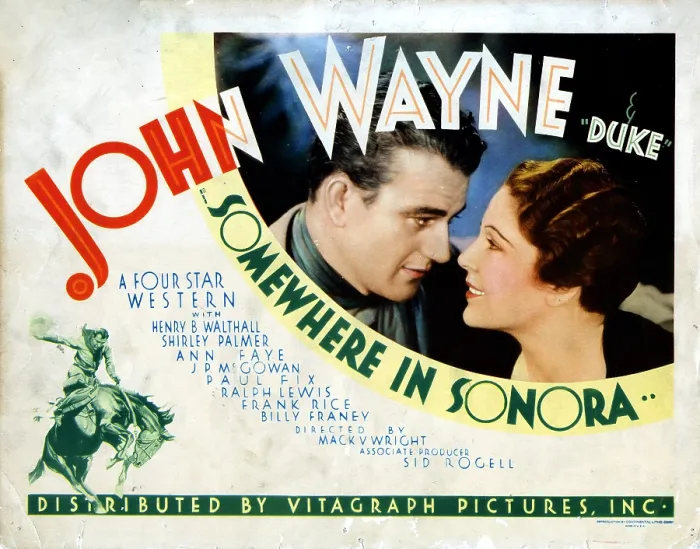 Framed Print : SOMEWHERE IN SONORA, from left, John Wayne, Shirley Palmer, 1933