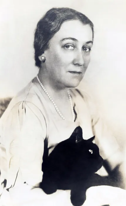 Framed Print : Sophie Kerr, famous writer with her pet alley cat Thomas Hardy'. Ca. 1936