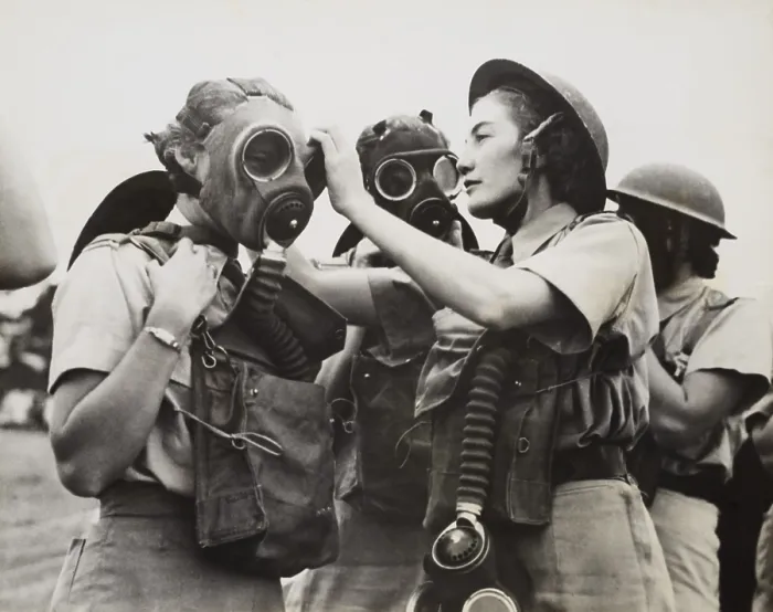 Framed Print : South African Women's Auxiliary Services sergeant is fitted with a gas mask. Unknown location during World War 2. April 1942. (BSLOC_2013-12_66) Framed Print : South African Women's Auxiliary Services sergeant is fitted with a gas mask. Unknown location during World War 2. April 1942. (BSLOC_2013-12_66)