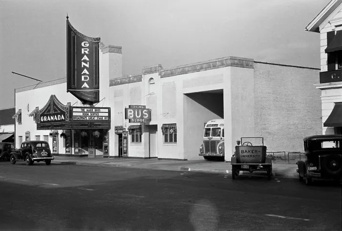 Framed Print : Southern California architecture in Lawrence, Kansas, the Granada Theater is showing ROOM SERVICE, with the Marx Brothers, photograph by John Vachon, October, 1938 Framed Print : Southern California architecture in Lawrence, Kansas, the Granada Theater is showing ROOM SERVICE, with the Marx Brothers, photograph by John Vachon, October, 1938
