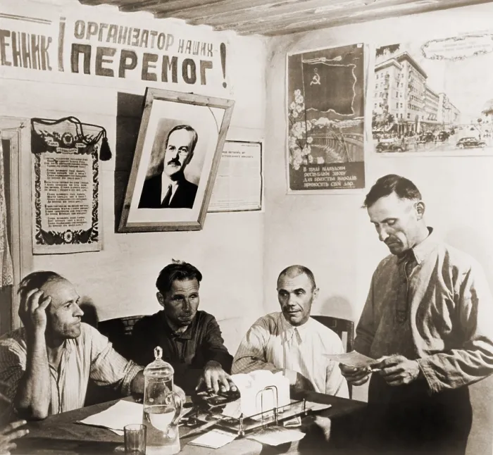 Framed Print : At a Soviet era collection farm in Russia, members of the governing committee meet to discuss production and farm management. 1952