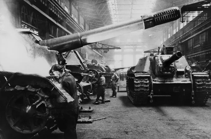 Framed Print : Soviets (Russians) assembling tanks at a Soviet plant in the Urals. The factory maintained day and night schedules during World War 2. (BSLOC_2014_8_48)
