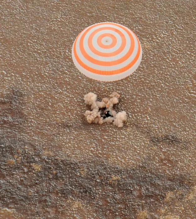 Framed Print : The Soyuz space craft carrying International Space Station crew lands in Kazakhstan