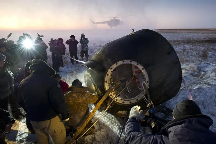 Framed Print : Soyuz TMA-02M spacecraft is opened by Russian land crew in Kazakhstan. The capsule returned International Space Station Expedition 29 after five months in space. Nov. 21, 2011