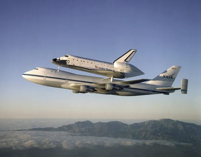 Framed Print : Space shuttle Atlantis atop the a customized 747 flies piggy back to the Kennedy Space Center after a ten month refurbishment. Sept. 1, 1998 Framed Print : Space shuttle Atlantis atop the a customized 747 flies piggy back to the Kennedy Space Center after a ten month refurbishment. Sept. 1, 1998