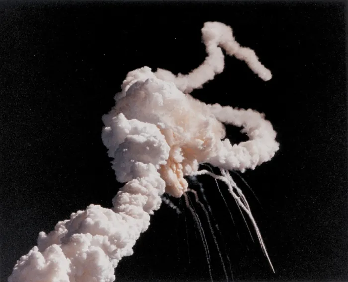 Framed Print : Space shuttle Challenger disaster. Space shuttle exhaust plumes entwined around a ball of gas after a few seconds after the explosion caused by ruptured O-rings. Jan. 28, 1986