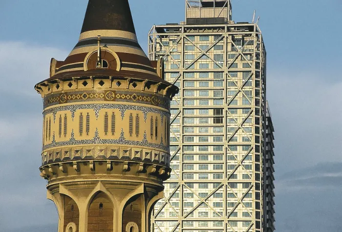 Framed Print : SPAIN. Barcelona. Gas Factory. Catalan Tower of Gas, work by Josep Domenech Estap in 1900 and, in the background, the Arts Hotel. Modernism. Architecture