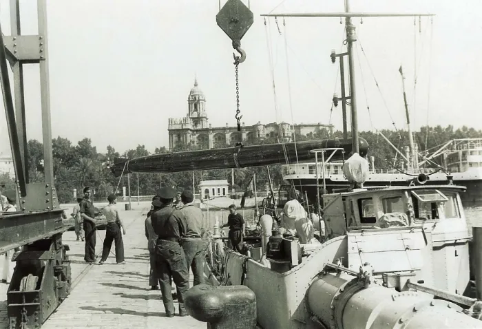 Framed Print : SPAIN. Malaga. Spanish Civil War (1936-1939). The torpedo boat Requet loading torpedos in the Malaga harbour (20th February 1937). AISA / Everett Collection**US SALES ONLY** Framed Print : SPAIN. Malaga. Spanish Civil War (1936-1939). The torpedo boat Requet loading torpedos in the Malaga harbour (20th February 1937). AISA / Everett Collection**US SALES ONLY**